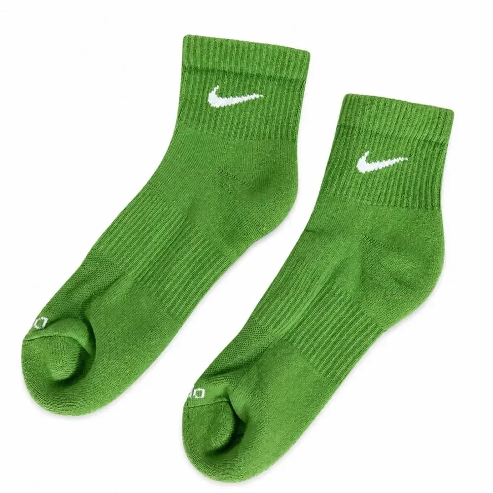 Nike green socks with white